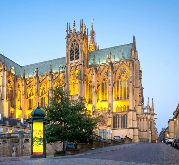 A beautiful, illuminated cathedral in the dusk.
